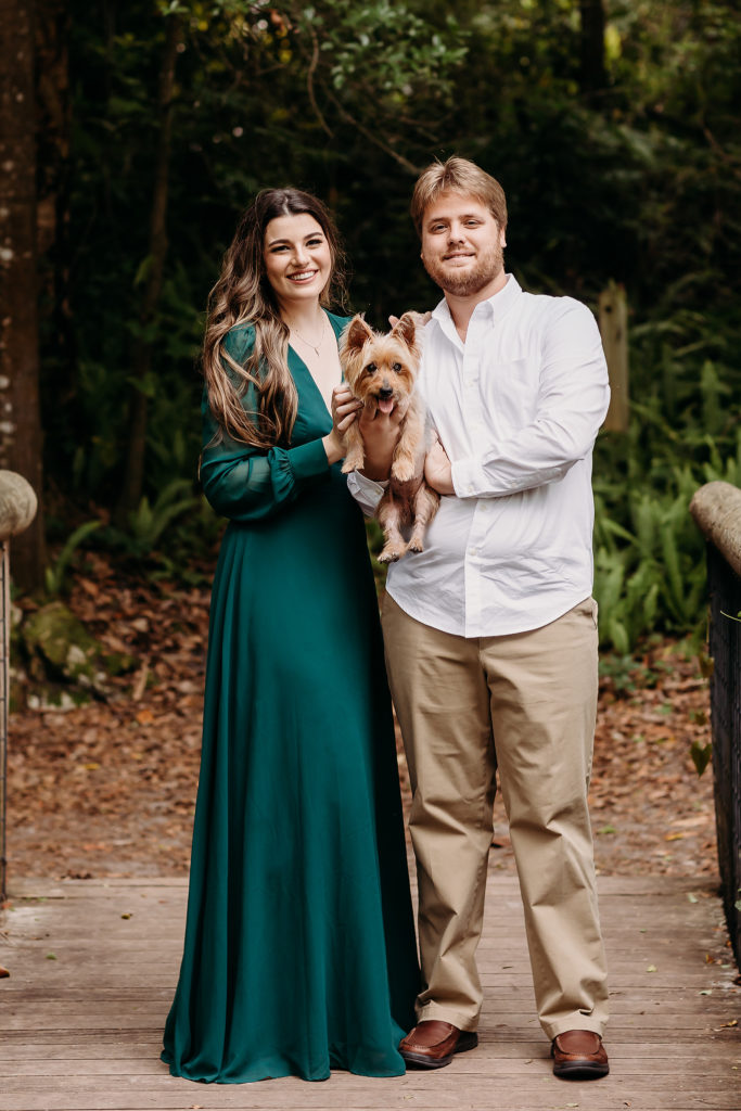 Engaged couple and their dog